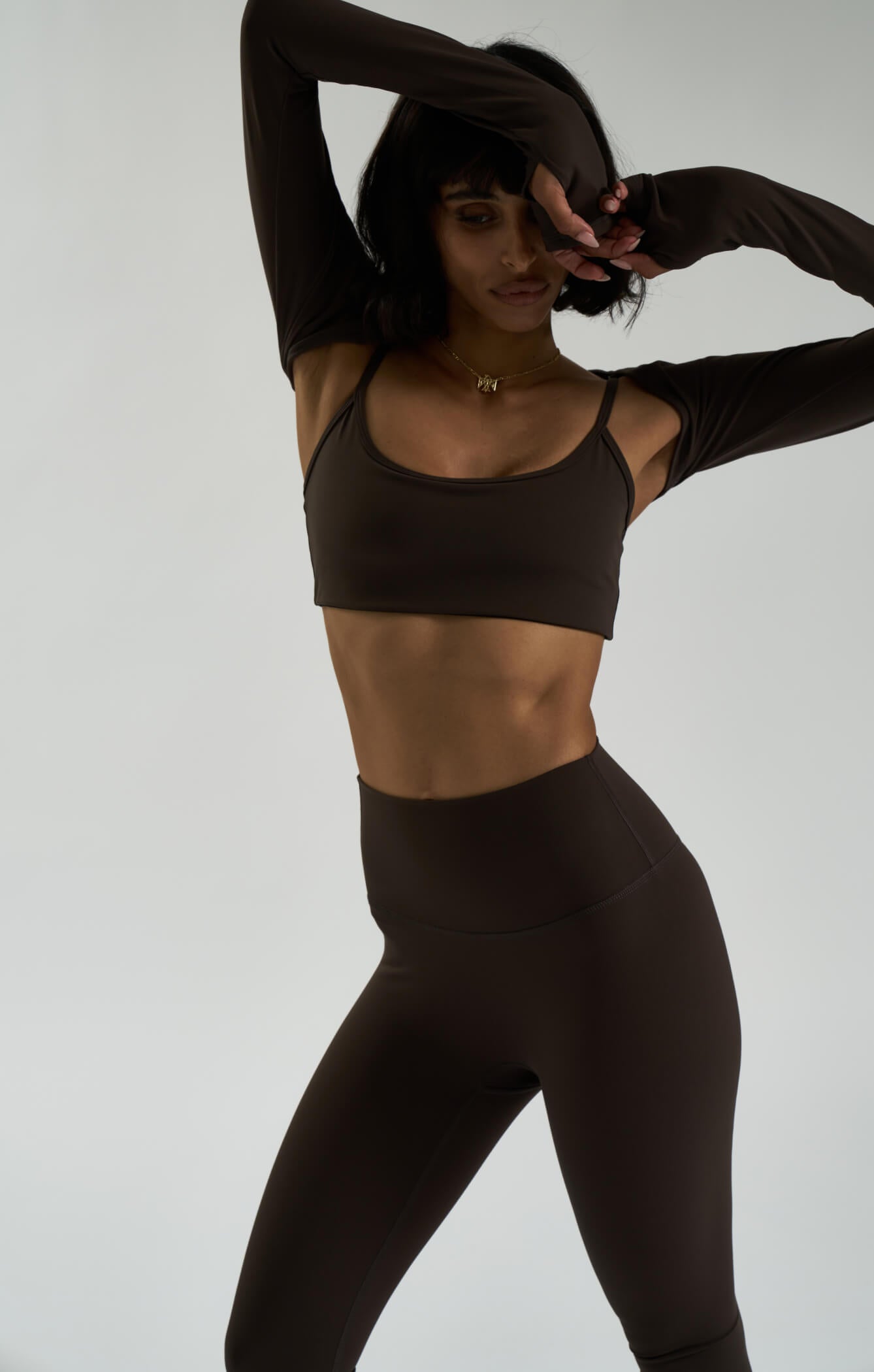 THE A.T.G SCULPT™ SEAMLESS CROP - ESPRESSO